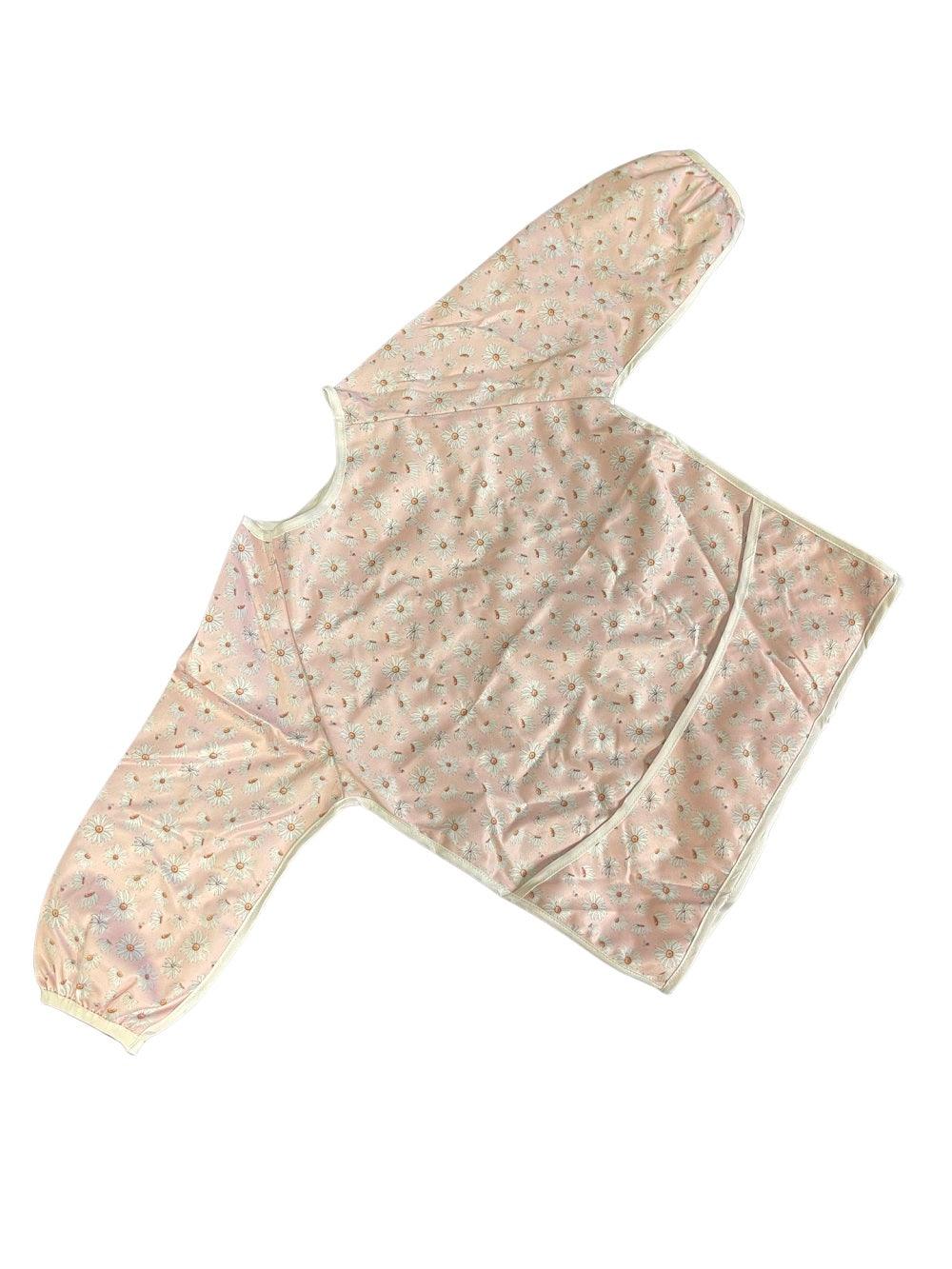 Yoho Baby & co. Toddler sleeved bib perfect for mealtimes and messy play. Pink Daisies Designer Print