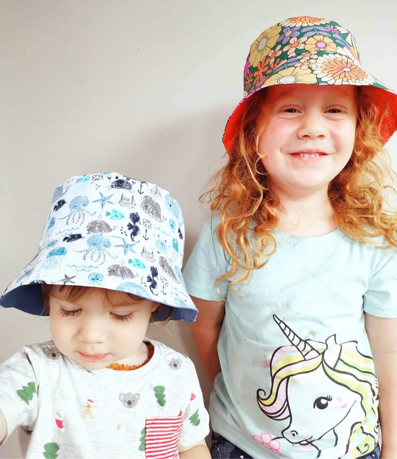 Yoho Baby & co. | Hand made by a Kiwi Mumma bucket hats for babies. Orange Blooms print